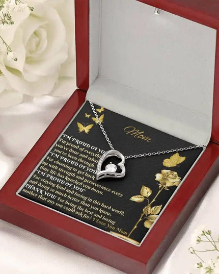 white gold forever love necklace in mahogany box angled right