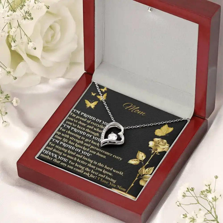 white gold forever love necklace in mahogany box angled right