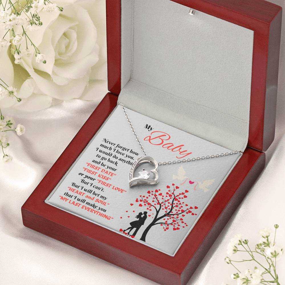 white gold forever love necklace in a luxury box angled right