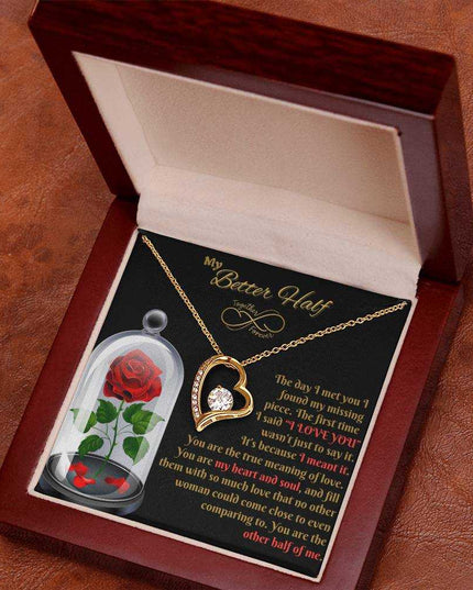 yellow gold forever love necklace in a luxury box angled right