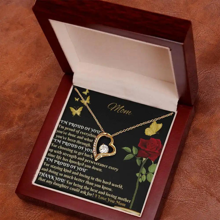 yellow gold forever love necklace in mahogany box