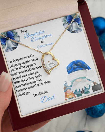 yellow gold forever love necklace in a luxury box in a model's hands