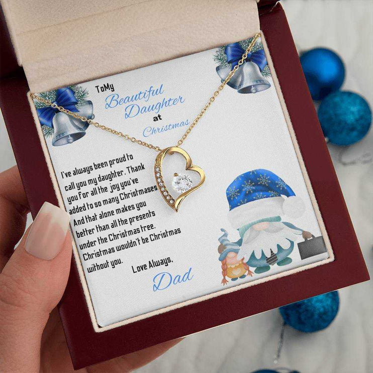 yellow gold forever love necklace in a luxury box in a model's hands