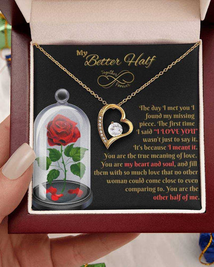yellow gold forever love necklace in luxury box in model's hand