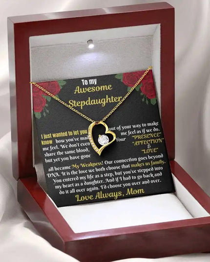 yellow gold forever love necklace in a mahogany box angled left