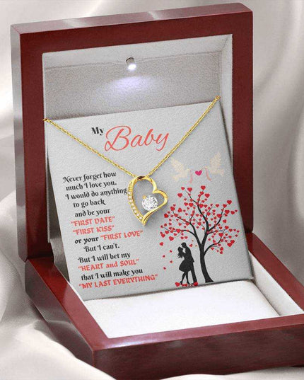 yellow gold forever love necklace in a luxury box with LED light on