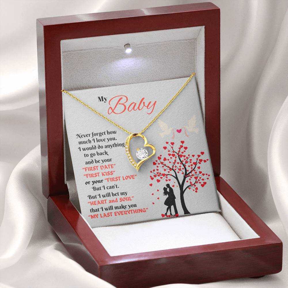 yellow gold forever love necklace in a luxury box with LED light on