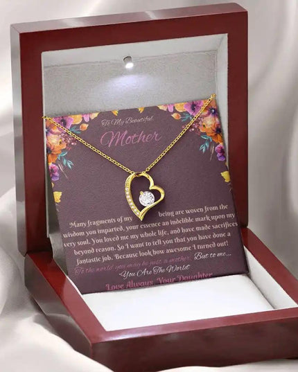 yellow gold forever love necklace in mahogany box angled left