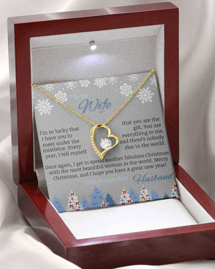 yellow gold forever love necklace in luxury box on white felt cloth