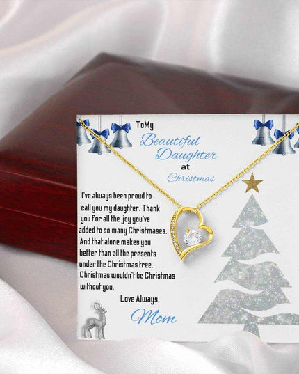yellow gold forever love necklace outside of a closed luxury box