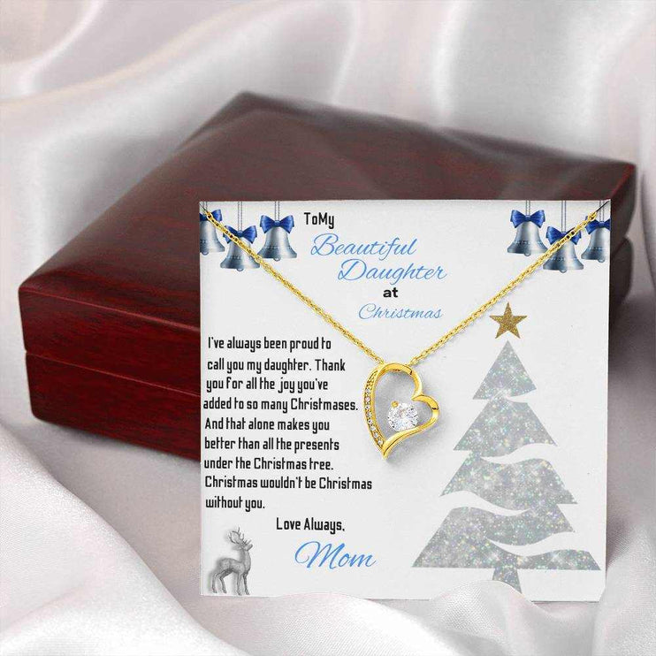 yellow gold forever love necklace outside of a closed luxury box