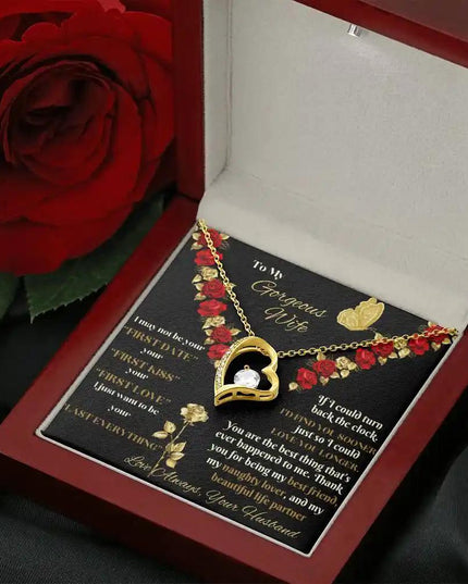 yellow gold forever love necklace in mahogany box angled right