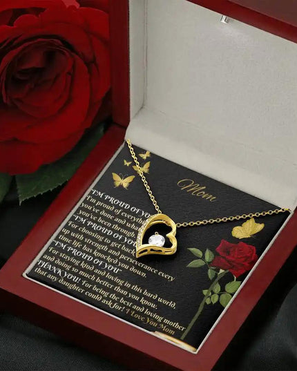 yellow gold forever love necklace in mahogany box angled right