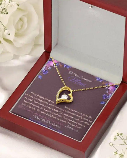 yellow gold forever love necklace in mahogany box angled right