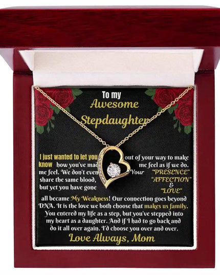 yellow gold forever love necklace on a mahogany box up close 