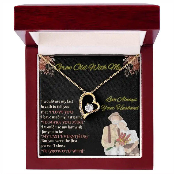 yellow gold forever love necklace in mahogany box