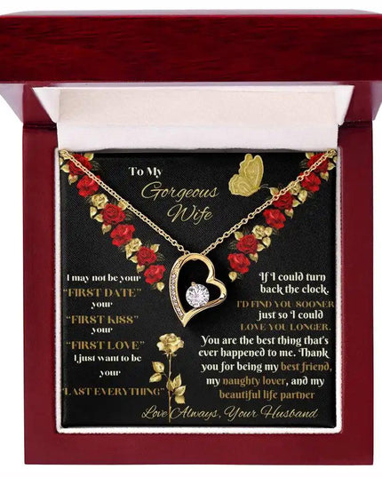 yellow gold forever love necklace in mahogany box top view