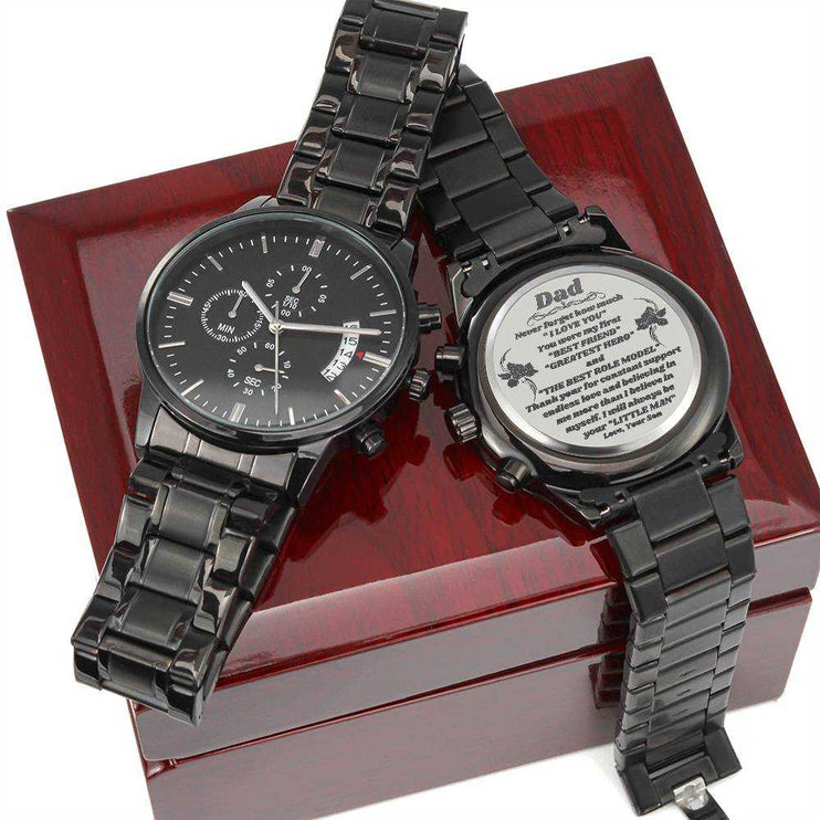 chronograph watch engraved on top of a closed luxury box