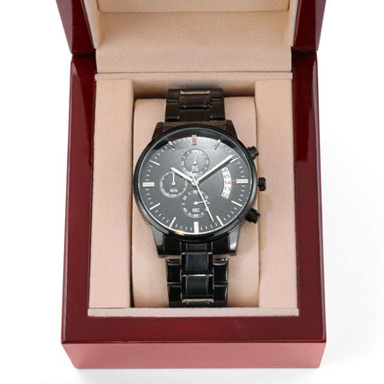 chronograph watch engraved in a luxury box up close