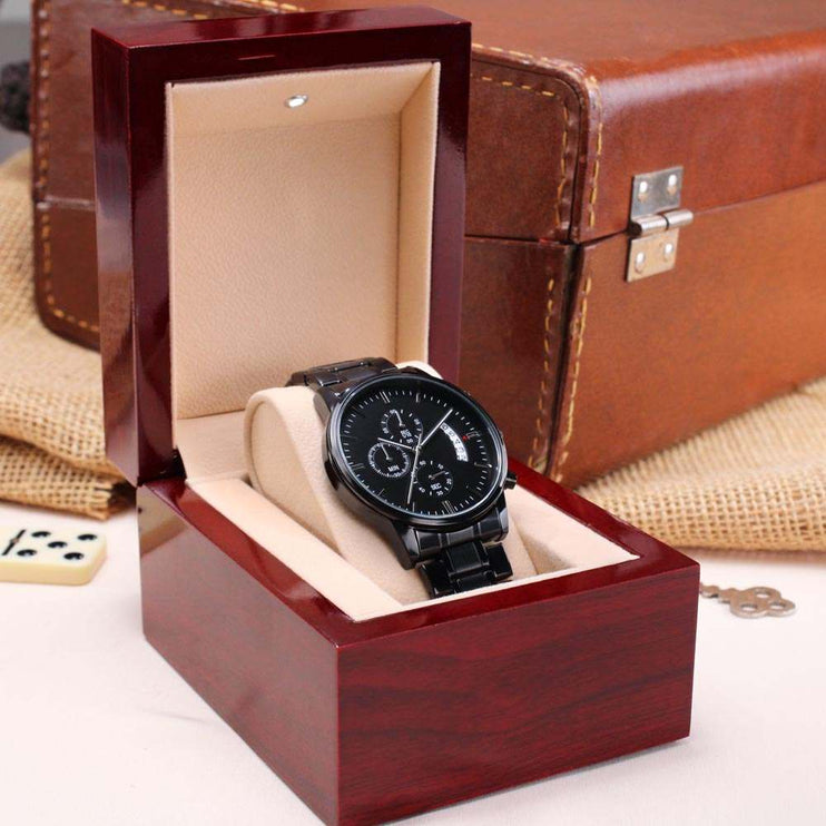 chronograph watch engraved in a luxury box angled left