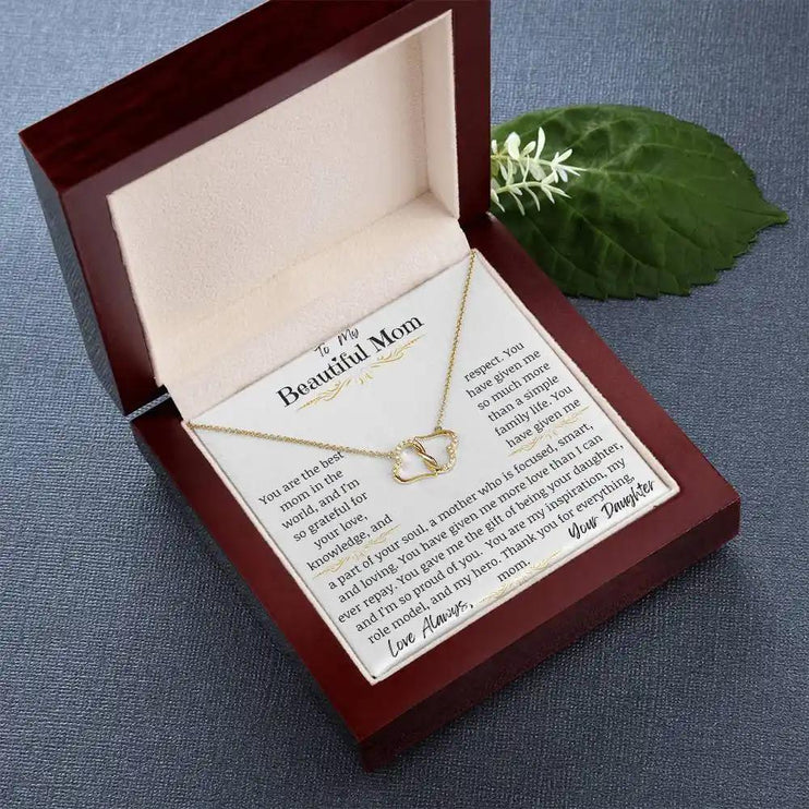 a everlasting love necklace in a mahogany box up close