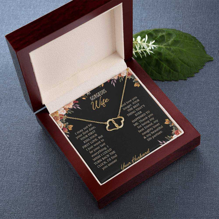  A 10k gold Everlasting Love Necklace in a mahogany box with a to wife greeting card turned sideways