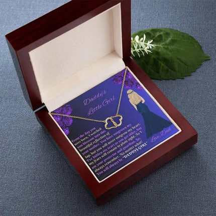 everlasting love necklace in a mahogany box angled left