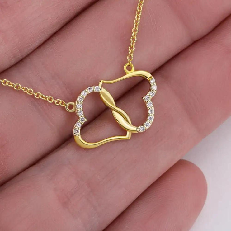 everlasting love necklace in models' hand