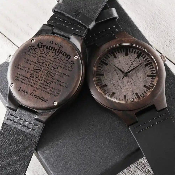 2 engraved wooden watch face down, and face up on a wallet