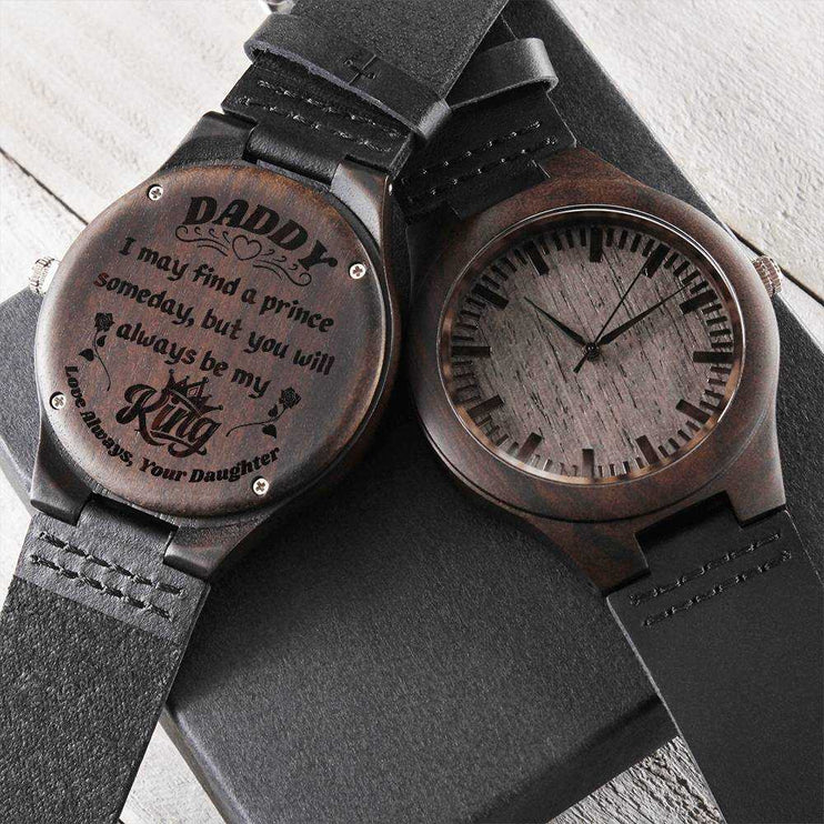 wooden watch engraved with two watches showing front and back