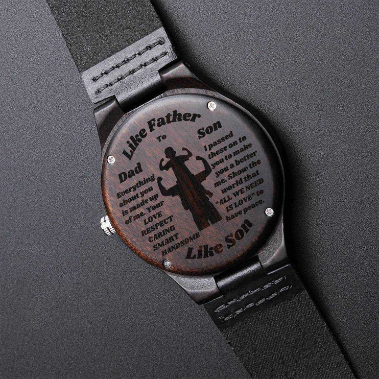 wooden watch engraved on a black canvas