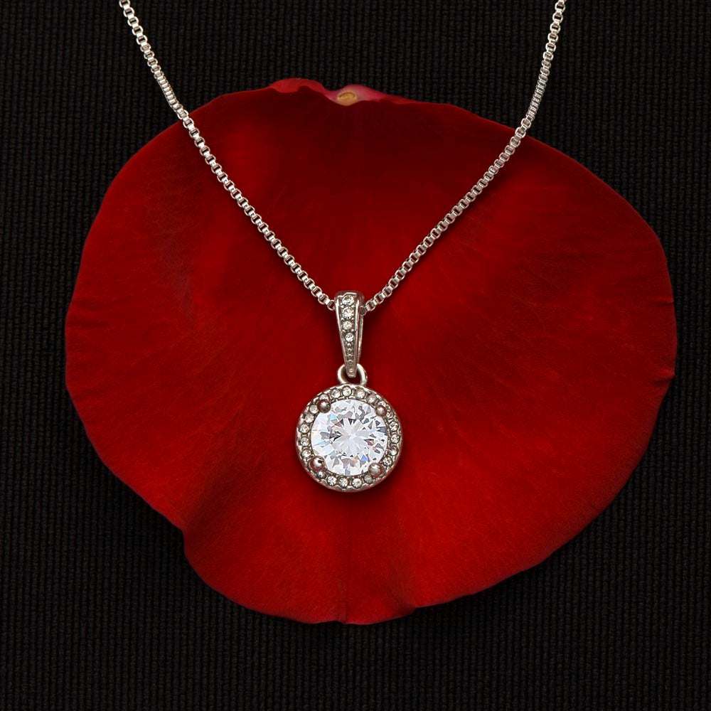 eternal hope necklace on a red rose petal