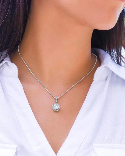 white gold eternal hope necklace on a model's neck