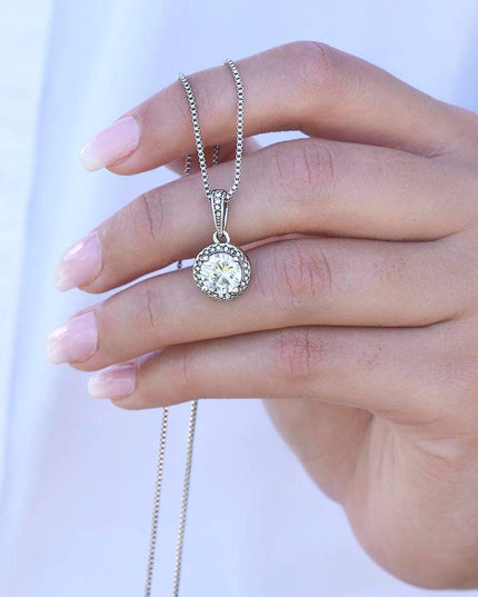 eternal hope necklace in a model's hand