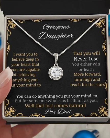 eternal hope necklace with a white gold charm in a two-tone box angle 2
