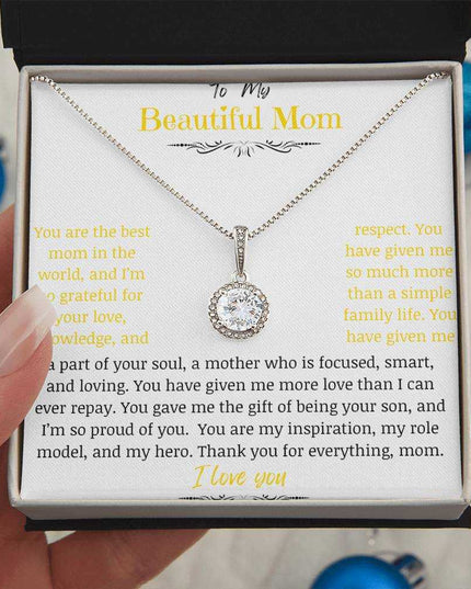A white gold eternal hope necklace close up in a two-tone box