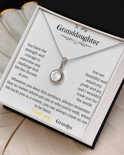 a white gold eternal hope necklace up close on coffee filter