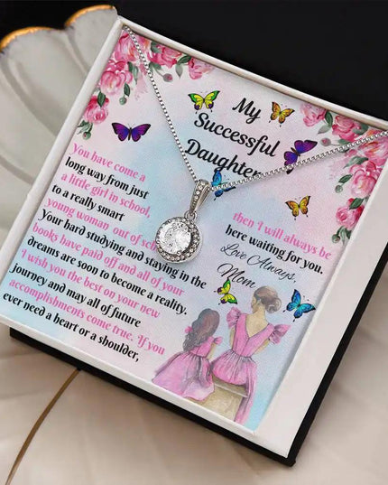white gold eternal hope necklace in a two-tone box angled right