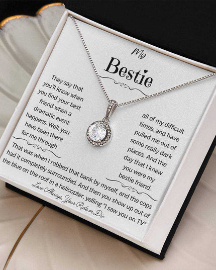 a eternal hope necklace up close in a white shell