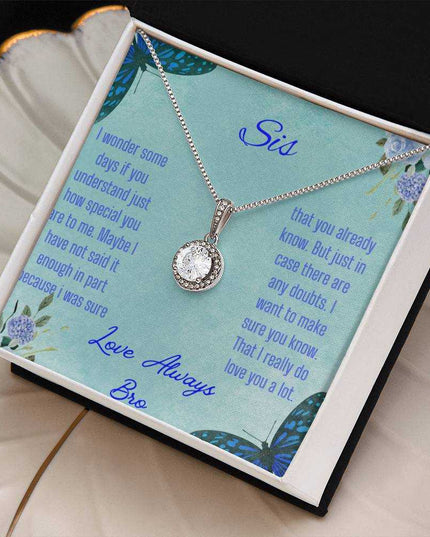 Eternal Hope Necklace on a To Sis from Bro greeting card in a two-tone box on a white coffee filter angled to the right