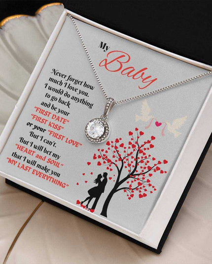 eternal hope necklace in a soft box with greeting card angled right