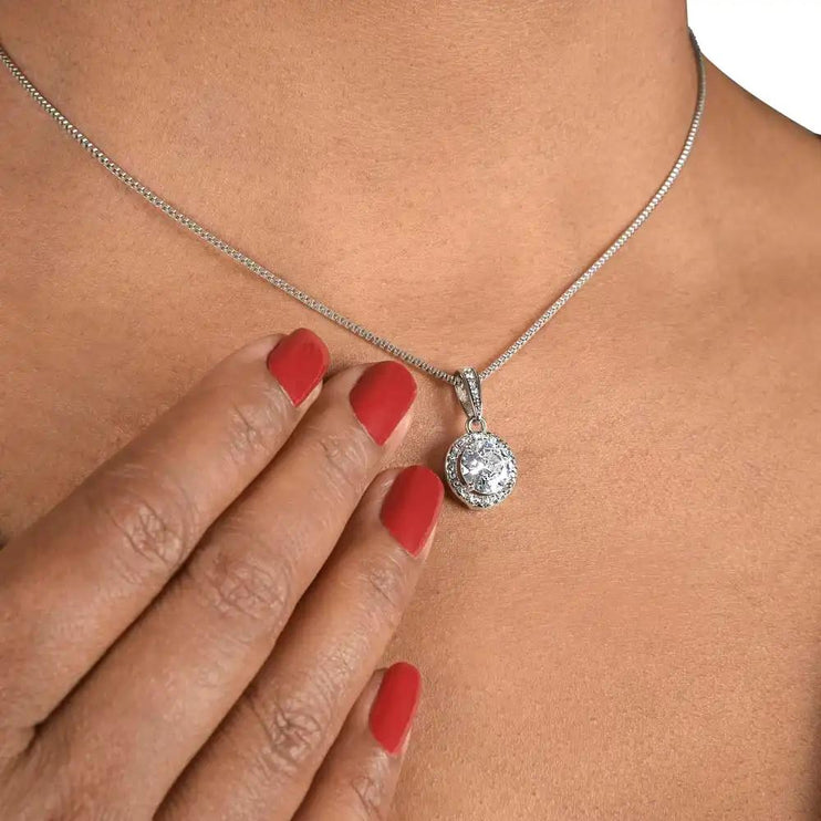 white gold eternal hope necklace on model's neck