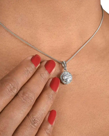white gold eternal hope necklace on a model's neck