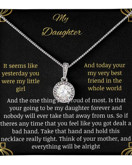 Eternal Hope Necklace close up in a two-tone box with a to daughter from mom greeting card