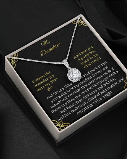 Eternal Hope Necklace in a two-tone box angled to the right against black background