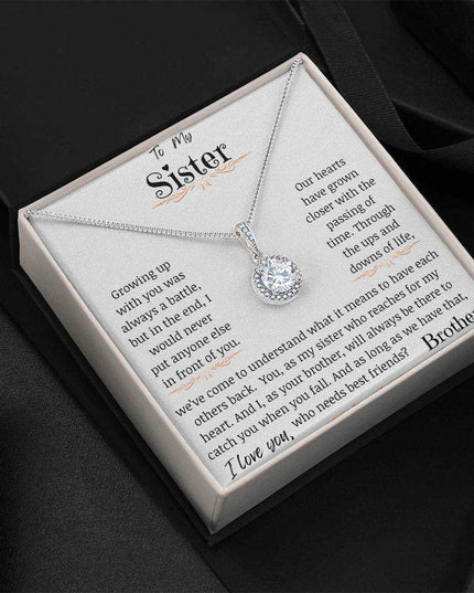 a eternal hope necklace in the dark angled left