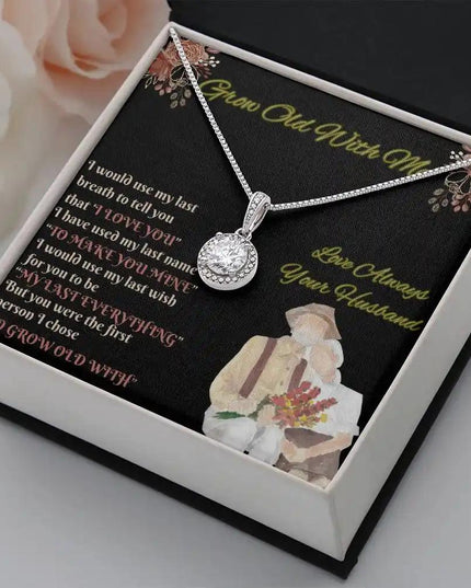white gold eternal hope necklace in a two-tone box angled right