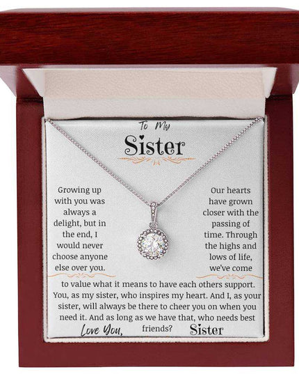 a eternal hope necklace up close in a mahogany box