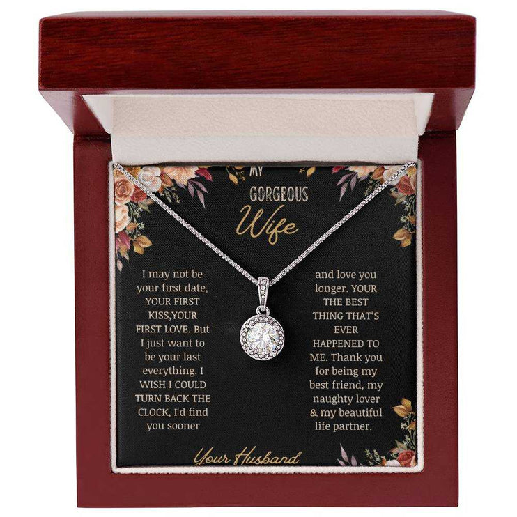 A white gold Eternal Hope Necklace on a to wife greeting card in a mahogany box