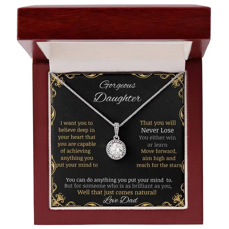 eternal hope necklace with a white gold charm in a mahogany box angle 1